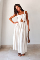 Unleash your inner bohemian with our FLORENCE LINEN MAXI SKIRT SET! Made with cool linen and tencil fabric, this set features intricate brown stitch detailing and an elastic back for a comfortable fit. The skirt's overlap detail adds a touch of whimsy, while the top's button closure and open torso give off a carefree vibe. Non-lined, runs true to size.