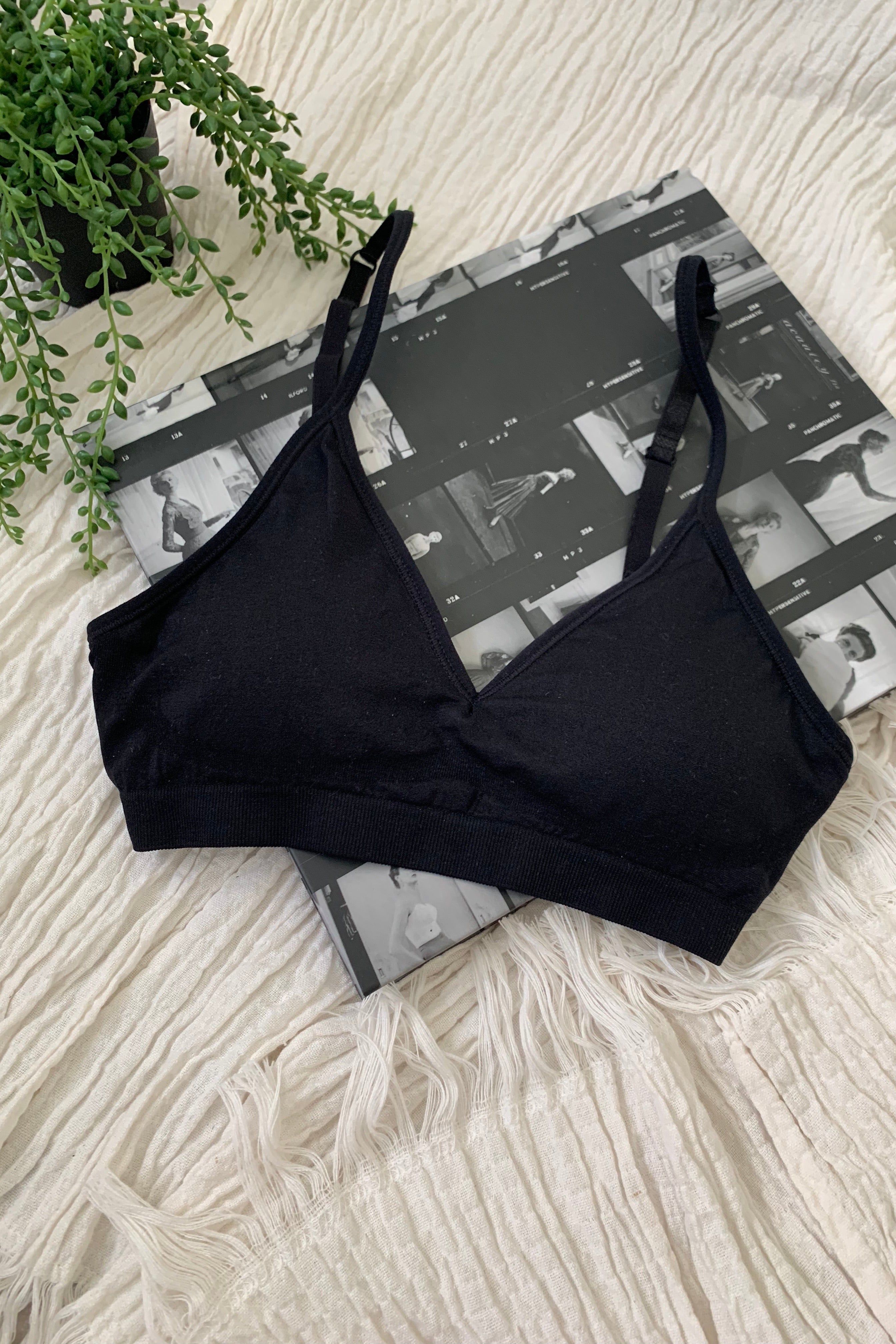 Embrace comfort and style with our CARMELA BRALETTE. Our most popular bralette to date, it features a slip-on design with removable padding and adjustable shoulder straps. Made with soft and stretchy nylon, this one size fits all bralette is perfect for all-day wear. Hand wash cold for best results.