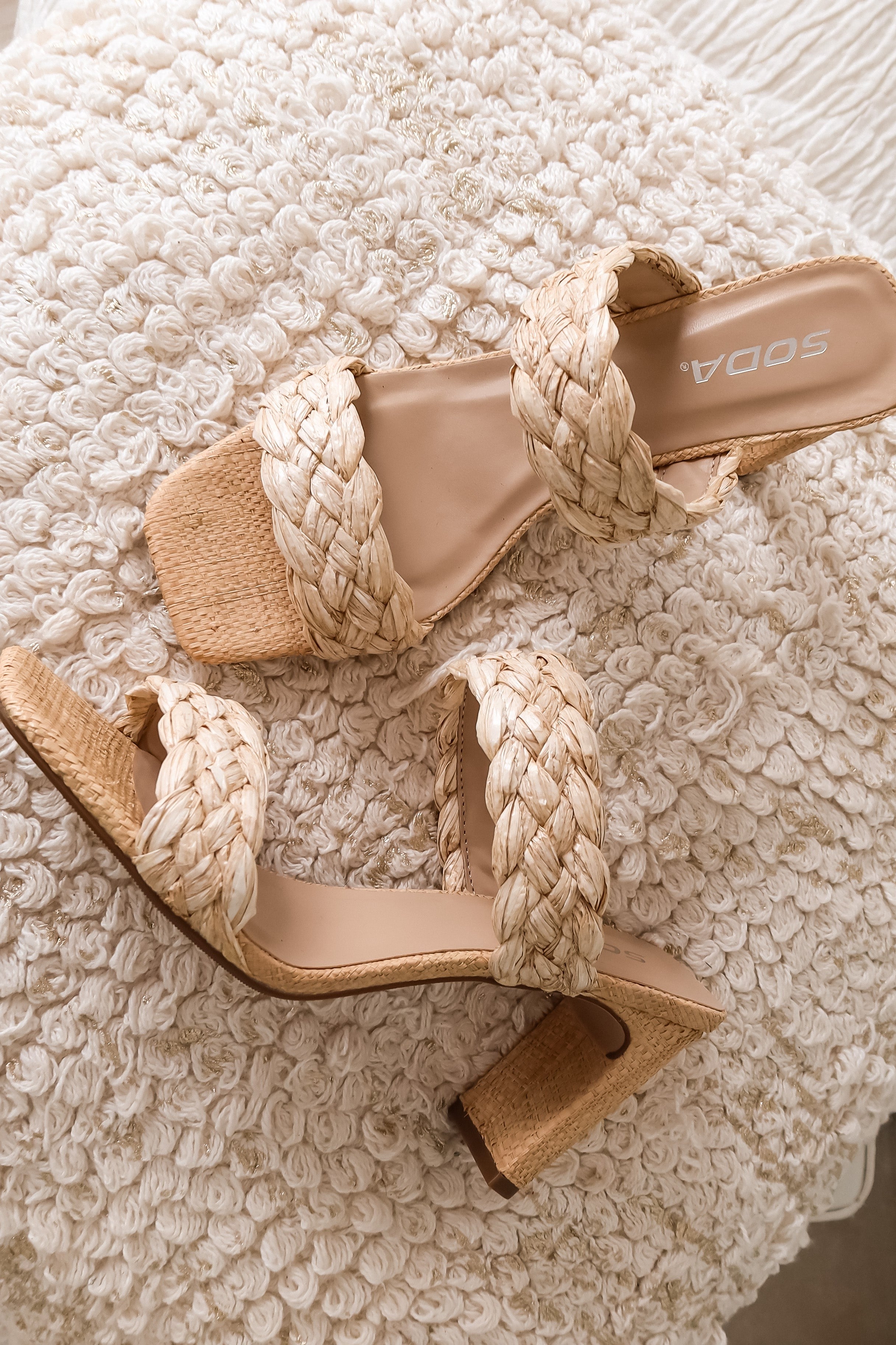 Step up your shoe game with our NATURAL RAFFIA HEEL. Stand tall with a 3 inch heel made from woven raffia straps. Elevate your style and keep it natural with this quirky and playful high heel.