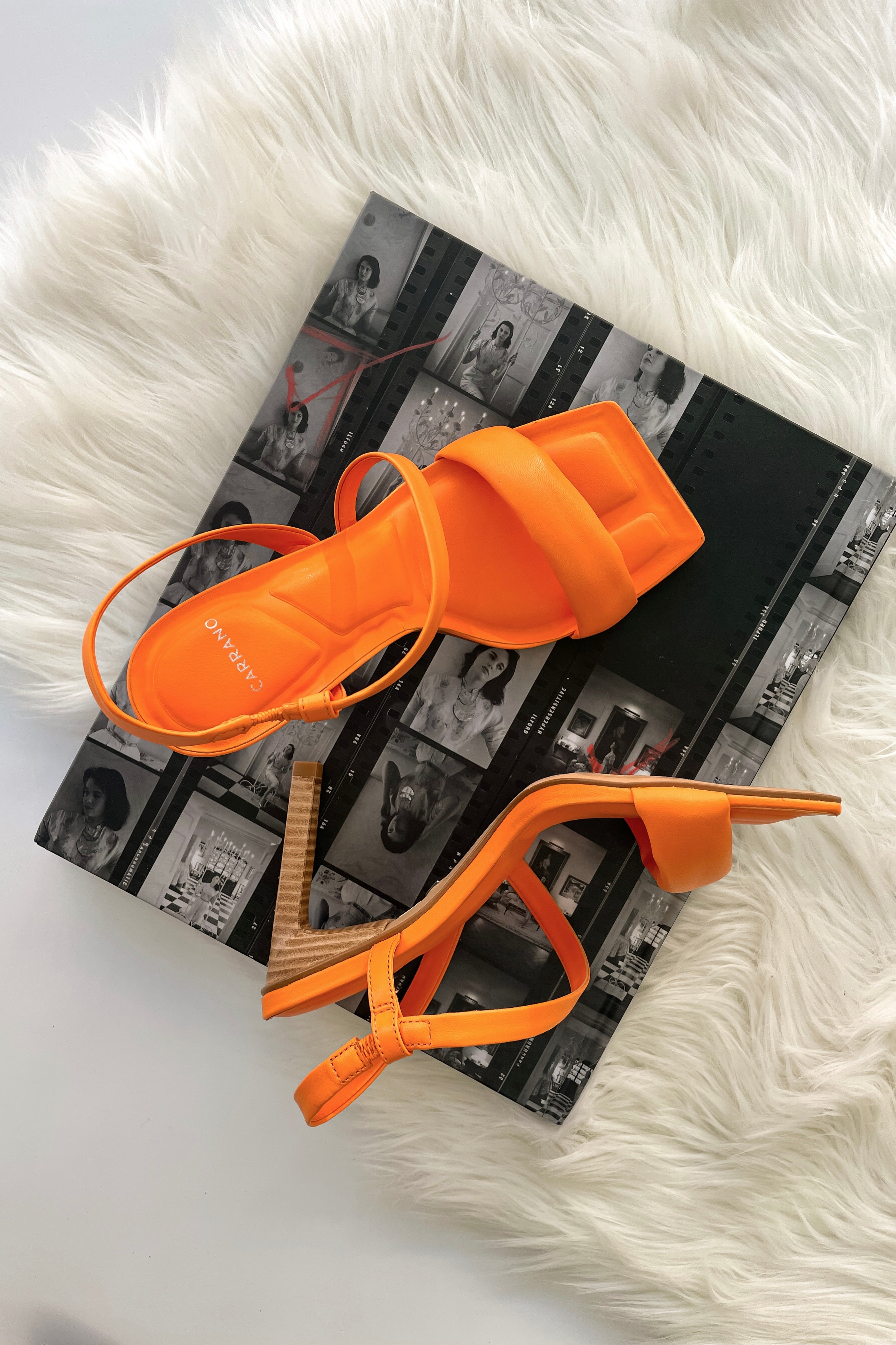 Step into style with the RIO SLING BACK HEEL. Crafted from super soft orange leather, these sling back heels add a pop of color to any outfit. With a wooden heel and true to size fit, these Brazilian-made heels are both comfortable and fashionable. No half sizes available.